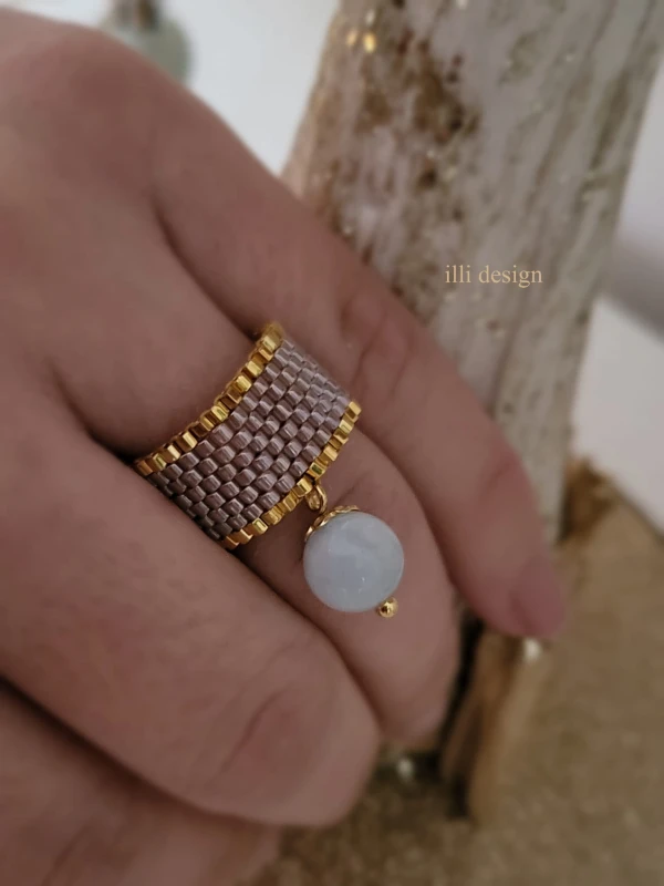 Pierścionek tkany z akwamarynem Zjawisko