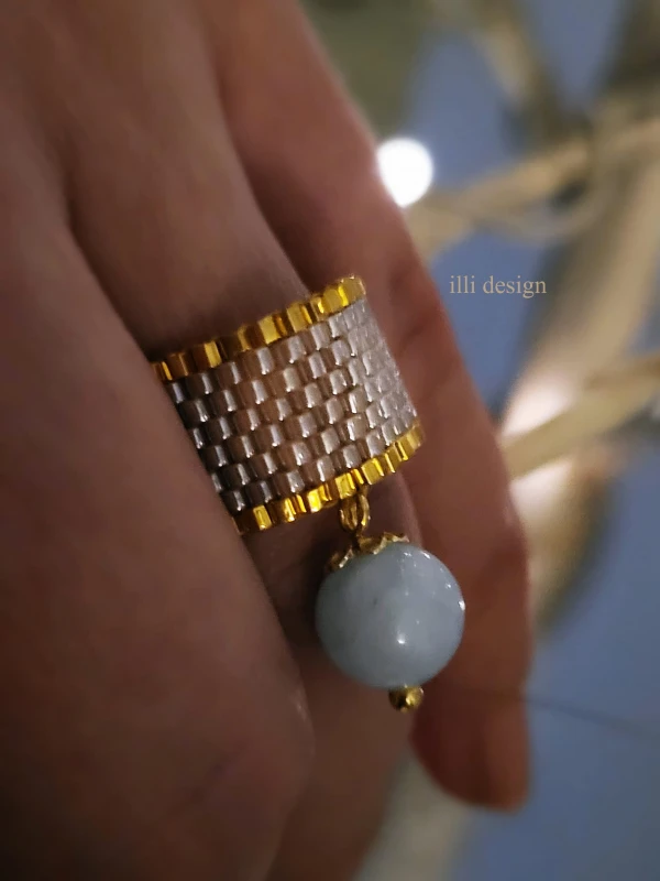 Pierścionek tkany z akwamarynem Zjawisko