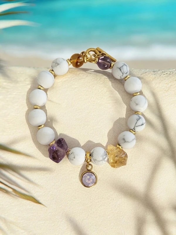 Bransoletka z białego jadeitu z ametystem cytrynem i zawieszką Biały Kruk