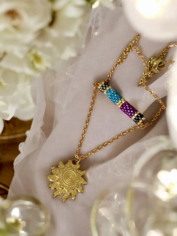 1000067814.jpeg Naszyjnik tkany Miyuki z pozłacaną zawieszką Słońca – Turkus & Magneta